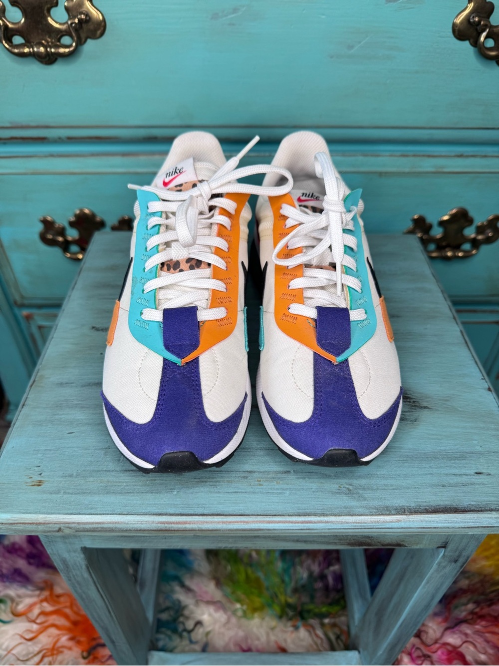 Nike White Sneakers with Purple, Teal & Orange Accents